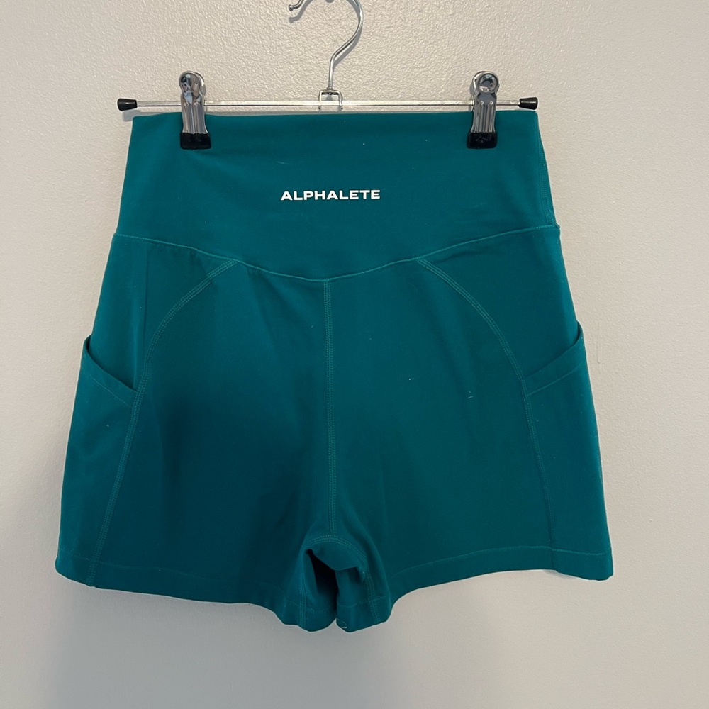 Size Medium Alphalete turquoise green shorts with pockets